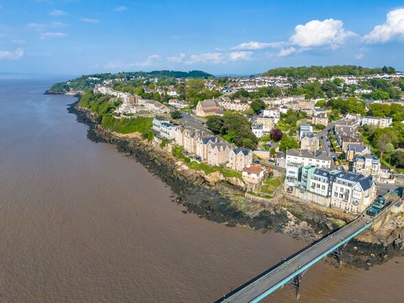 Aerial view of Clevedon seafront and pier stretching into the Bristol Channel, Somerset