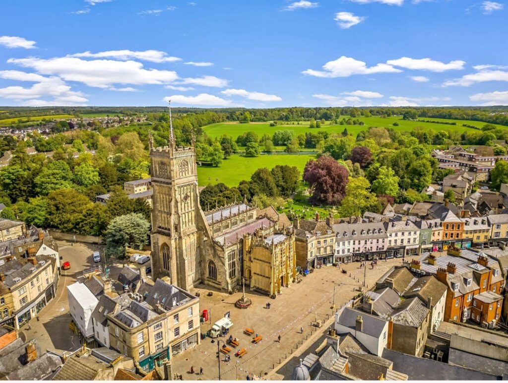 Aerial view of Cirencester town centre and church