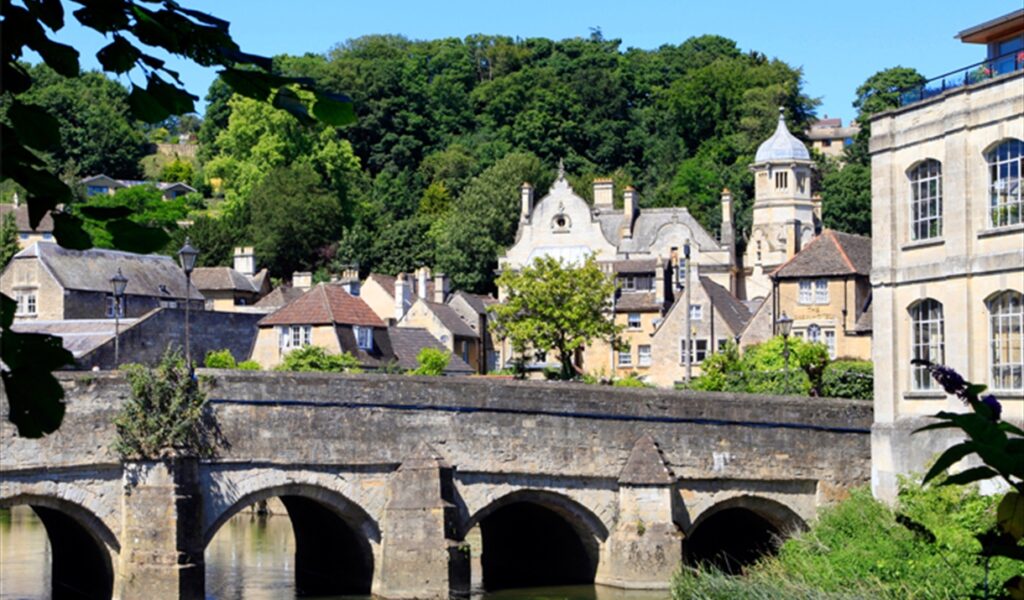 Historic stone bridge over the River Avon with traditional buildings in Bradford-on-Avon, Wiltshire