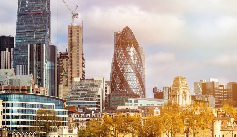 Skyline view of central London with modern buildings, ideal for London City airport transfers and chauffeur services.