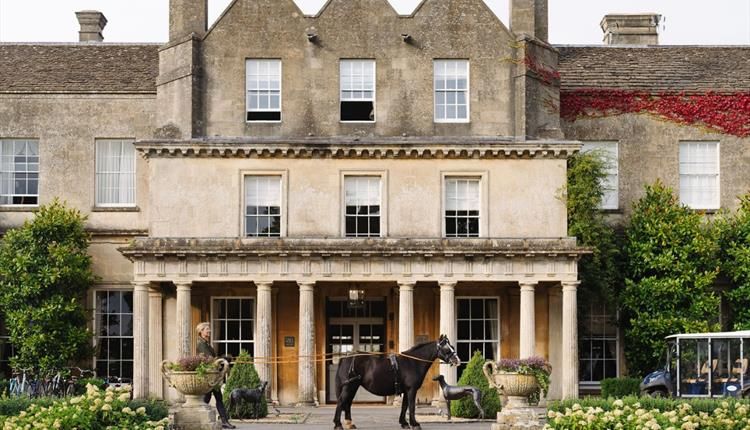 Lucknam Park Hotel & Spa in Colerne with grand Georgian façade and horse at the entrance
