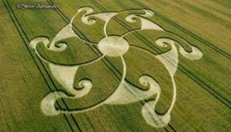 Intricate circular crop formation in a green field near Etchilhampton, Wiltshire
