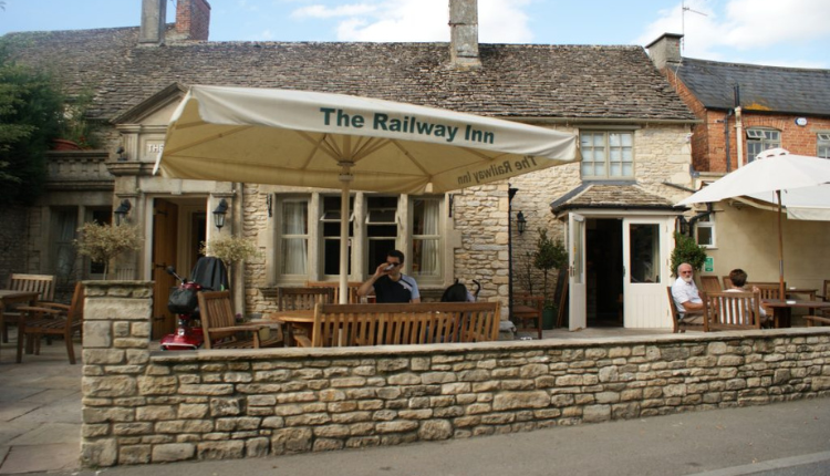 Outdoor seating area at The Railway Inn in Fairford.